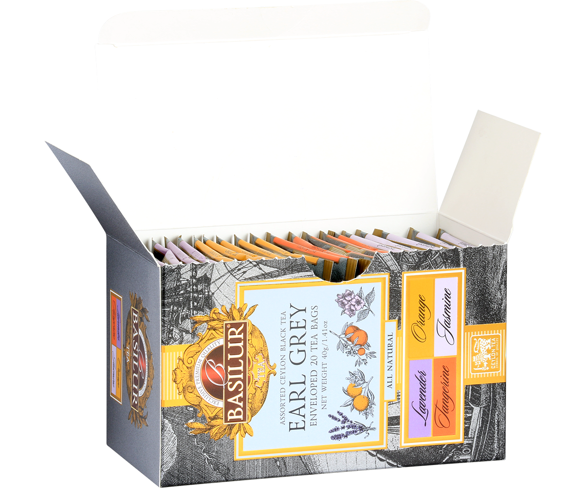 Otwarte pudełko Basilur Earl Grey z zapakowanymi torebkami herbat.