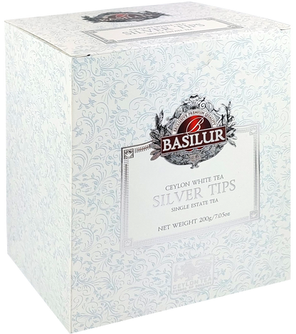 Bok pudełka Basilur Silver Tips z delikatnym ornamentem i logo marki.