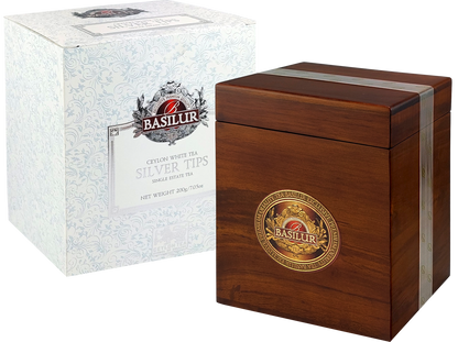 Zestaw Basilur Silver Tips – biała herbata w drewnianym pudełku i ozdobnym kartonie.