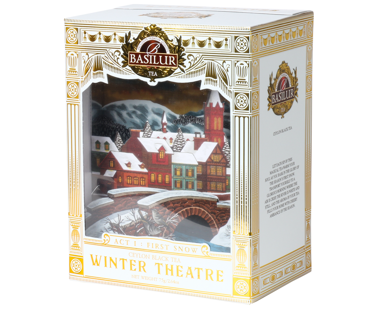 Front pudełka herbaty Basilur Act I: First Snow z ilustracją zimowego miasteczka.