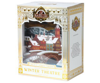 Front pudełka herbaty Basilur Act I: First Snow z ilustracją zimowego miasteczka.