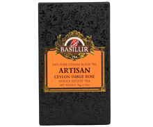 Przód pudełka Basilur Ceylon Imbue Rose w eleganckiej czarno-pomarańczowej szacie graficznej.