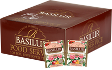 Opakowanie zbiorcze Basilur Wild Rose z widocznymi saszetkami herbaty owocowo-ziołowej z dziką różą.