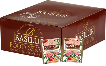 Opakowanie zbiorcze Basilur Wild Rose z widocznymi saszetkami herbaty owocowo-ziołowej z dziką różą.