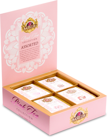 Zestaw herbat Basilur Pink Tea Collection w otwartym pudełku z widocznymi czterema smakami.