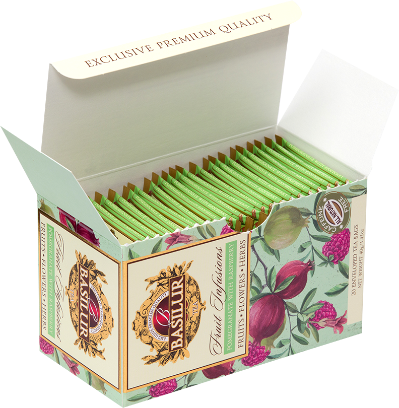 Otwarta herbata Basilur Pomegranate With Raspberry z widocznymi saszetkami w zielonych kopertkach.