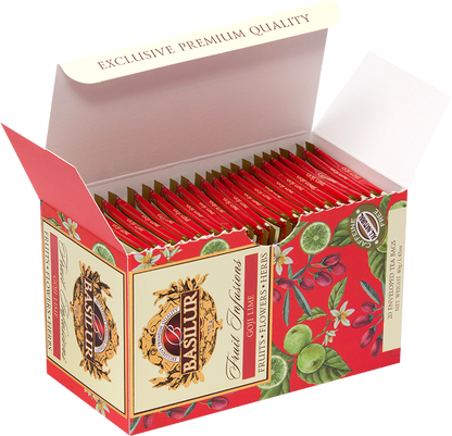 Otwarta herbata Basilur Goji Lime z widocznymi czerwonymi kopertkami herbat.