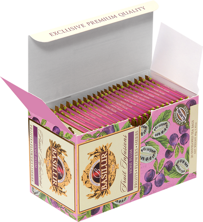 Otwarta herbata Basilur Noni Plum z widocznymi różowymi kopertkami.