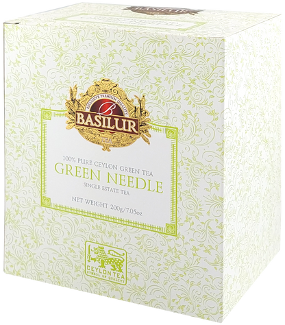 Bok kartonowego opakowania Basilur Green Needle z subtelnym zielonym wzorem.