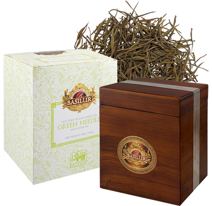 Zestaw Basilur Green Needle – zielona herbata cejlońska w eleganckim drewnianym pudełku i ozdobnym kartonie.