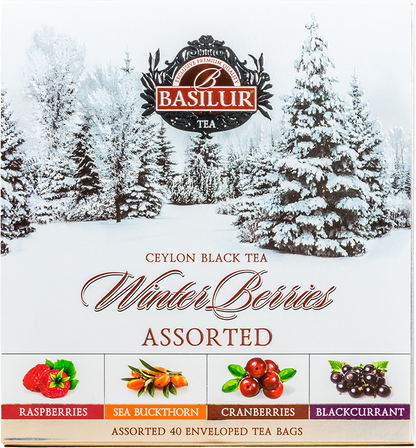 Herbata Basilur Winter Berries w eleganckim zimowym pudełku z motywem śnieżnych drzew.