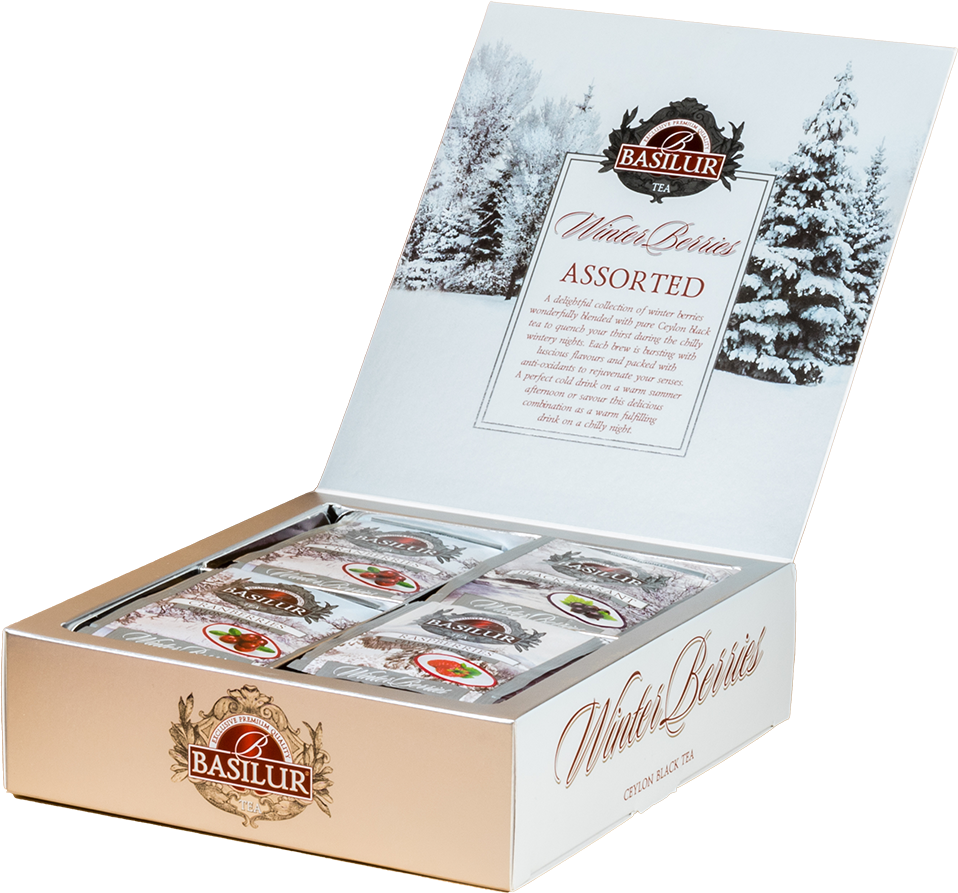 Zestaw herbat Basilur Winter Berries w otwartym pudełku – widoczne saszetki herbat owocowych.