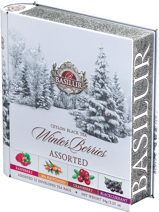 Puszka w kształcie książki Basilur Winter Berries z zimowym motywem.