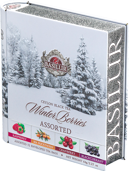 Puszka w kształcie książki Basilur Winter Berries z zimowym motywem.