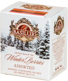 Zimowy zestaw herbat Basilur Winter Berries w białym opakowaniu z ośnieżonym krajobrazem.