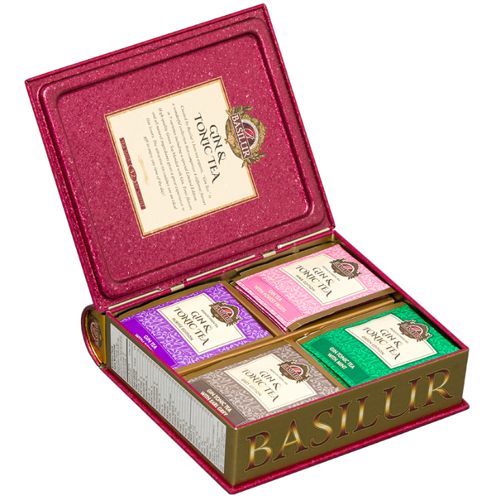 Otwarty zestaw Basilur Gin & Tonic Tea z czterema rodzajami herbat w kolorowym wnętrzu.