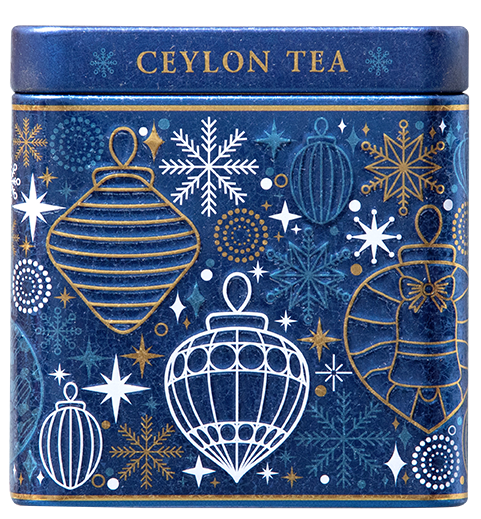 Puszka herbaty Basilur Gift of Cheer z motywem śnieżynek i bombek, eleganckie opakowanie.