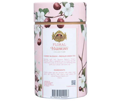 Herbata Basilur Cherry Blossom w eleganckiej różowej tubie z motywem kwitnących wiśni.