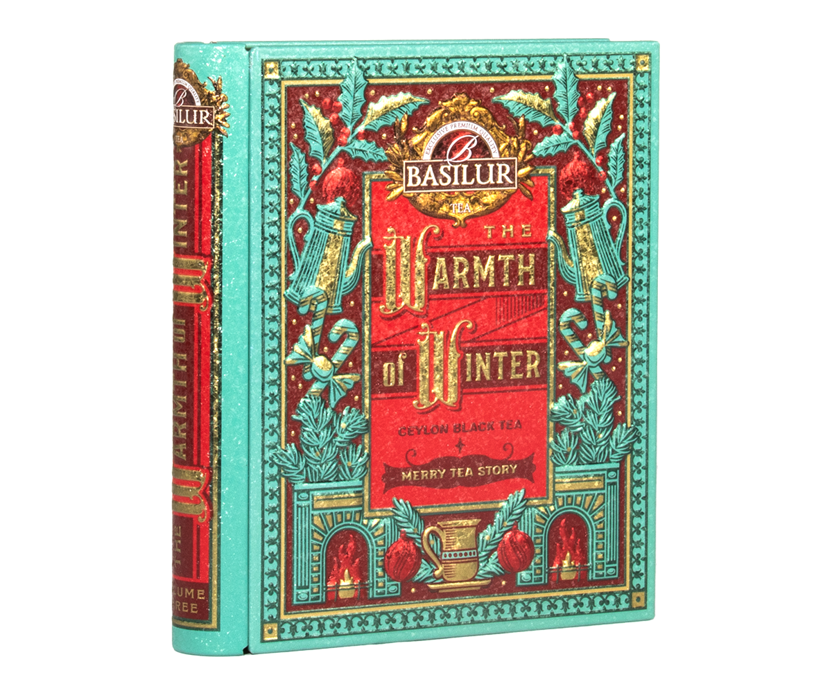 Puszka Basilur Warmth of Winter vol. I w formie książki z bogatym świątecznym motywem.