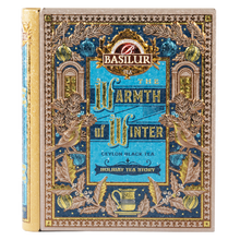 Puszka herbaty Basilur w formie książki z ozdobną zimową grafiką na okładce