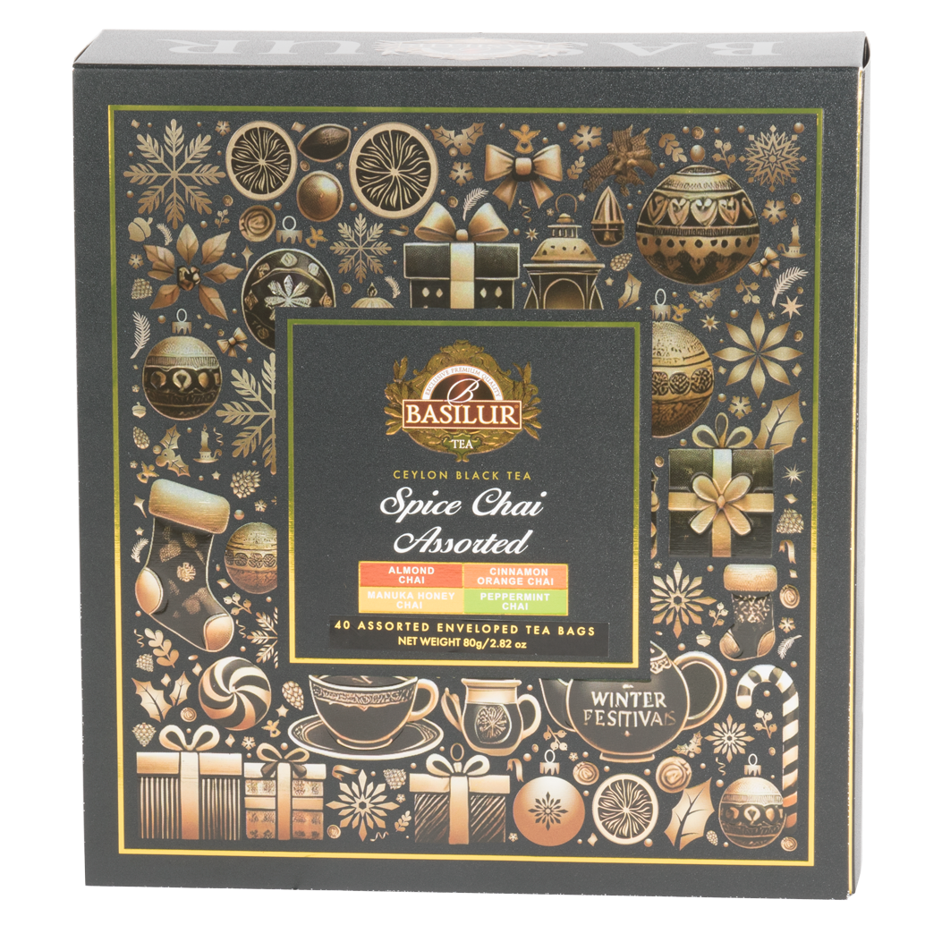 Przód pudełka Basilur Spice Chai Assorted z motywem zimowych ozdób i logo Basilur.