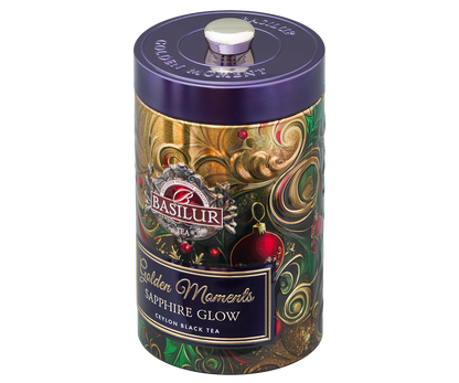 Puszka Basilur Golden Moments Sapphire Glow z ozdobnym świątecznym motywem.