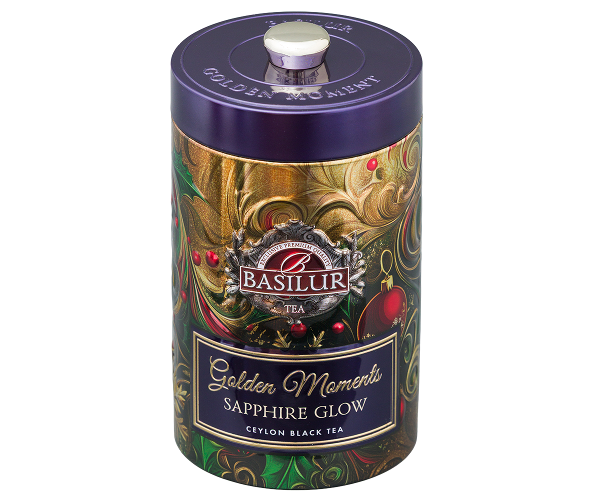Herbata Basilur Golden Moments Sapphire Glow w metalowej puszce z fioletową pokrywką.
