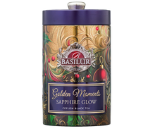 Przód puszki Basilur Golden Moments Sapphire Glow z logo Basilur i złotymi zdobieniami.