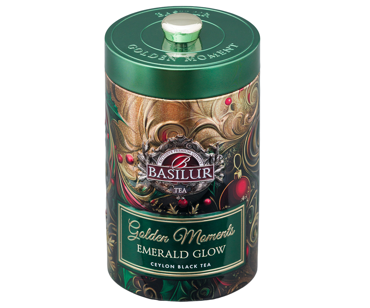 Puszka Basilur Golden Moments Emerald Glow z eleganckim zielonym wieczkiem.