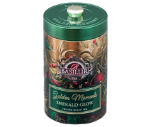 Puszka Basilur Golden Moments Emerald Glow z eleganckim zielonym wieczkiem.