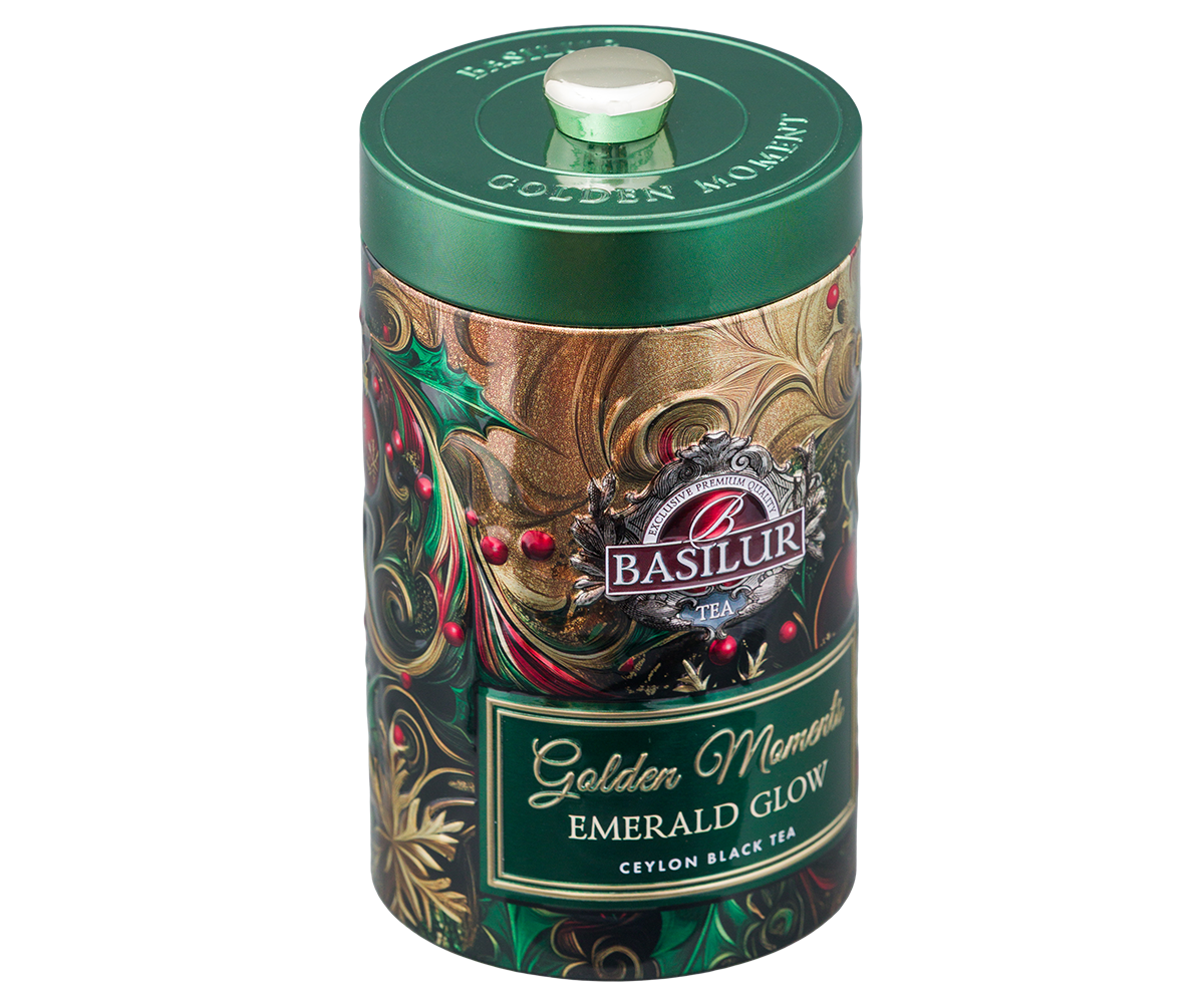 Zdobione opakowanie Basilur Golden Moments Emerald Glow z bożonarodzeniowym motywem.