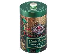 Zdobione opakowanie Basilur Golden Moments Emerald Glow z bożonarodzeniowym motywem.
