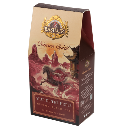 Herbata czarna Basilur Crimson Spirit w eleganckim czerwono-złotym opakowaniu z motywem konia, inspirowana orientem.
