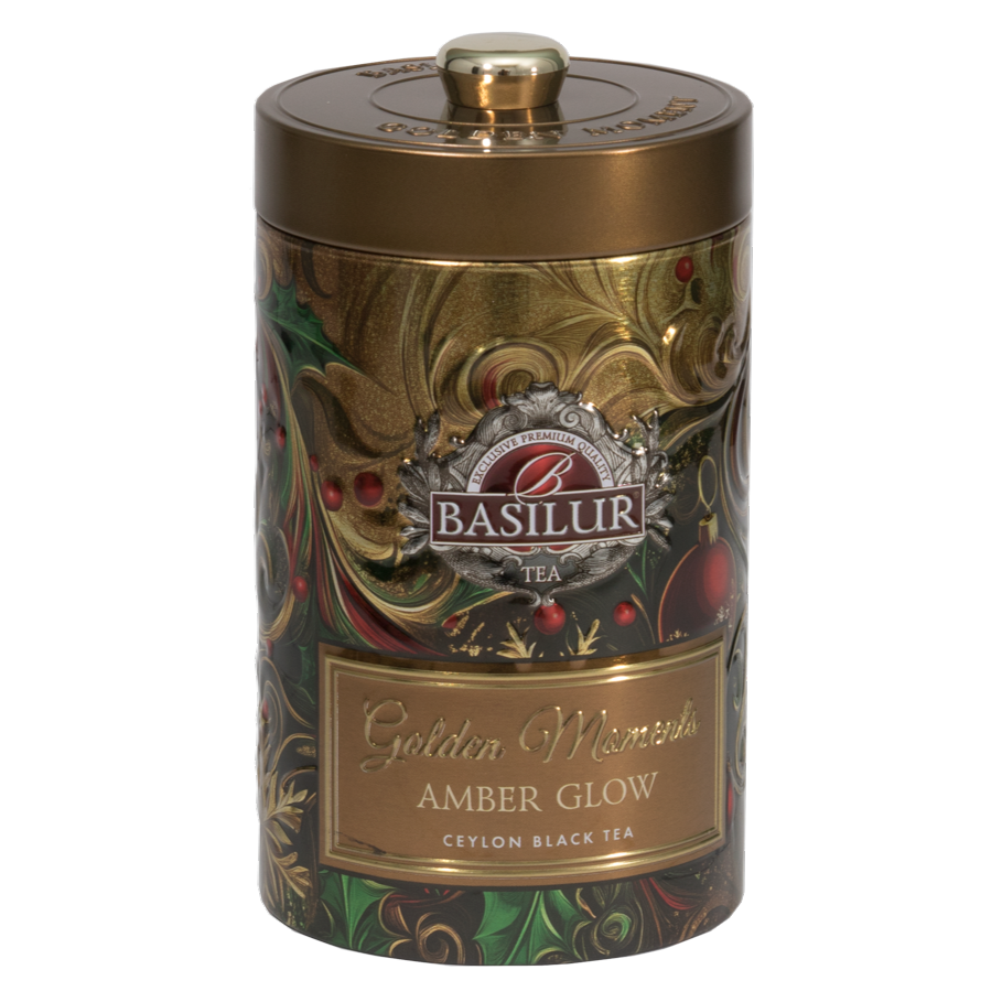 Puszka Basilur Golden Moments Amber Glow w złotym kolorze z eleganckim świątecznym zdobieniem.