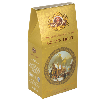 Herbata Basilur Golden Light – czarna herbata cejlońska w złotym opakowaniu z zimowym motywem.