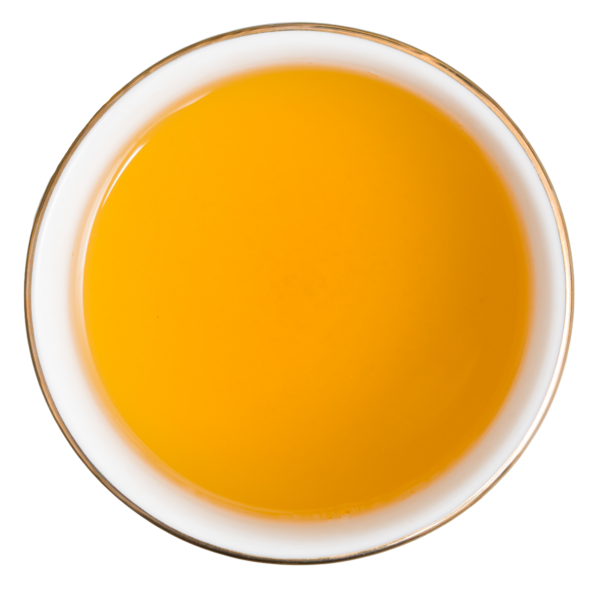 Złocisty napar zielonej herbaty Basilur Peach & Elderflower widziany z góry w filiżance.