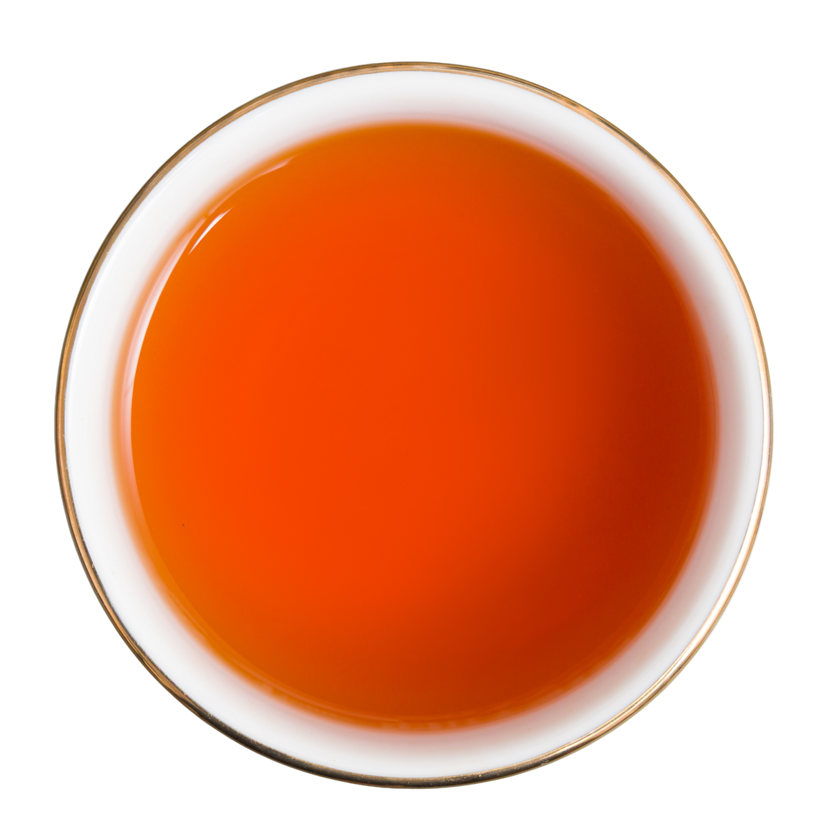 Napar z czarnej herbaty Basilur Berry Twist o intensywnej bursztynowej barwie widziany z góry.
