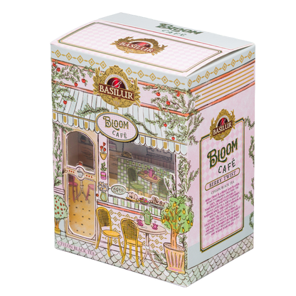 Herbata czarna Basilur Berry Twist w dekoracyjnym opakowaniu Bloom Café pokazanym pod kątem.