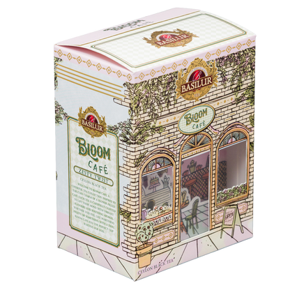 Herbata czarna Basilur Zesty Twist w ozdobnym opakowaniu Bloom Café pokazanym pod kątem.