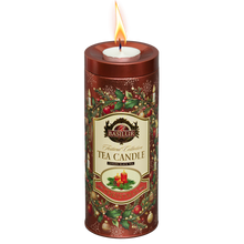 Herbata czarna Basilur Tea Candle Red w świątecznej czerwonej puszce z zapaloną świeczką tealight na wieczku.