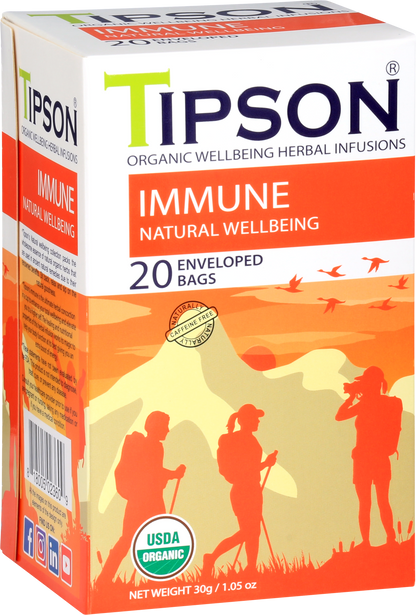 Przód opakowania herbaty Tipson Immune Natural Wellbeing z ilustracją osób na tle gór.