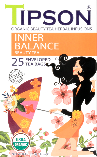 Zbliżenie opakowania herbaty Tipson Inner Balance Beauty Tea z motywem parasolki i kwiatów.