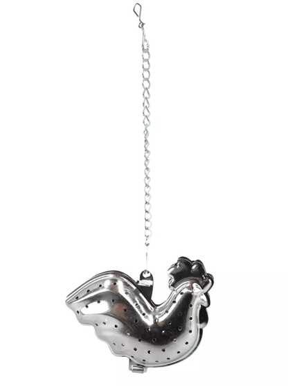 Metalowy zaparzacz do herbaty w kształcie koguta z łańcuszkiem do zawieszenia.