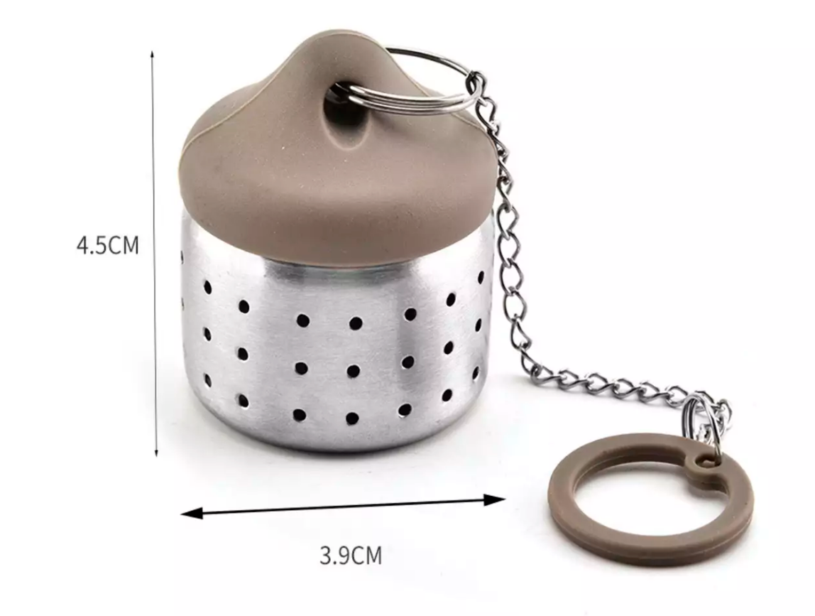 Brązowy zaparzacz do herbaty na łańcuszku z zaznaczonymi wymiarami.