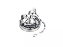 Metalowy zaparzacz do herbaty w kształcie kaczuszki z łańcuszkiem i podstawką