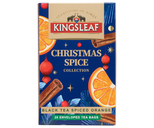 Herbata Kingsleaf Black Tea Spiced Orange w świątecznym granatowym opakowaniu z pomarańczą i cynamonem.