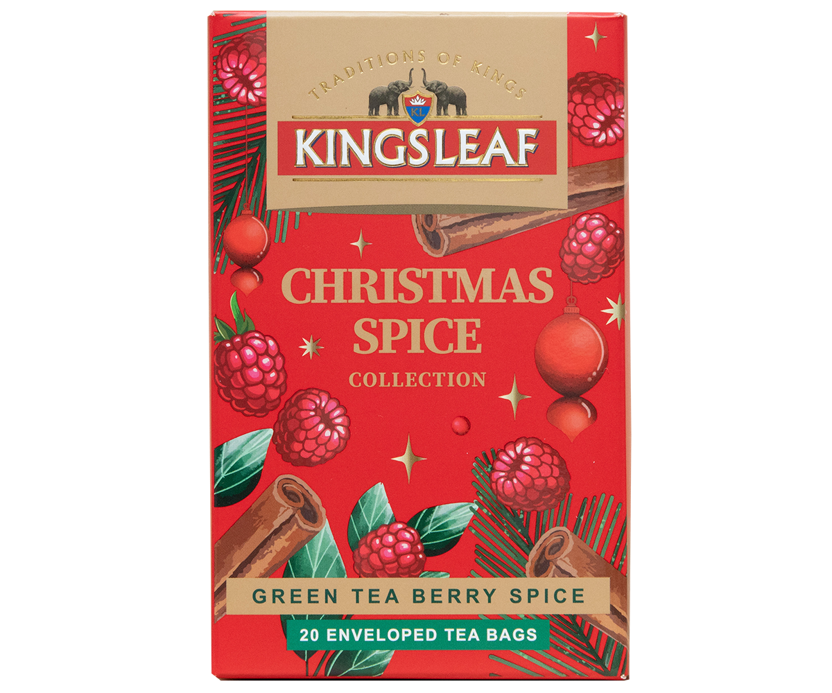 Herbata Kingsleaf Green Tea Berry Spice w świątecznym czerwonym opakowaniu z malinami i przyprawami.