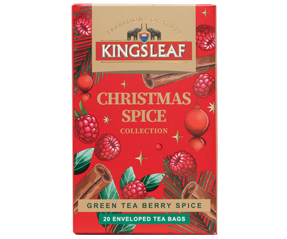 Herbata Kingsleaf Green Tea Berry Spice w świątecznym czerwonym opakowaniu z malinami i przyprawami.