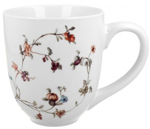 Kubek Safa – widok z boku z subtelną dekoracją kwiatową.