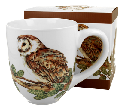 Kubek porcelanowy XXL Sowy o pojemności 1000 ml ustawiony obok ozdobnego pudełka.